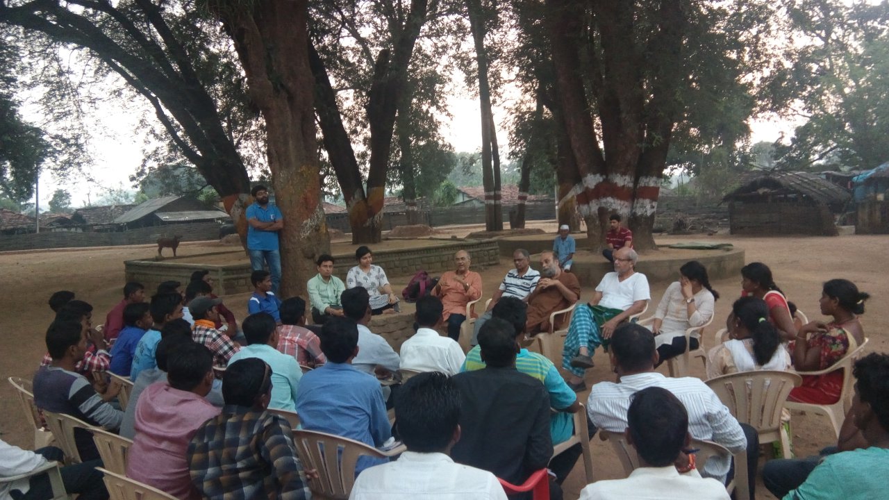 Community participants, educators, and field researchers engaged in a group collaboration and planning workshop in India