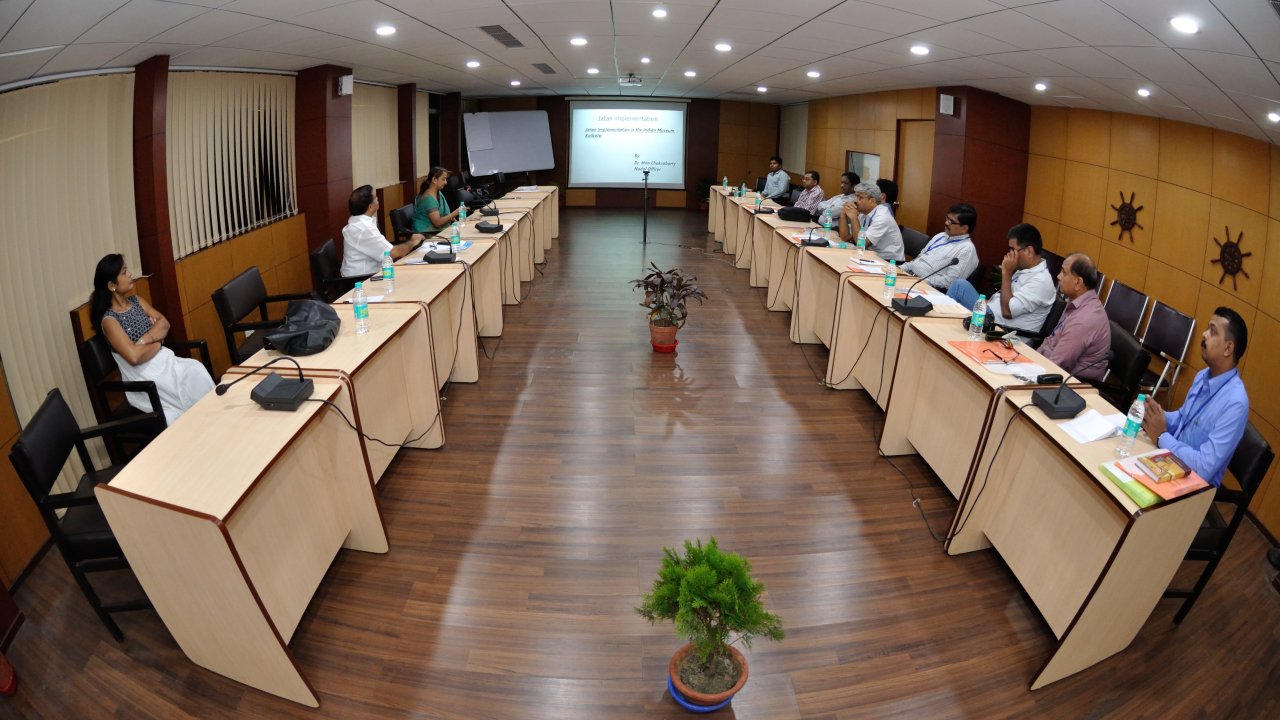 Institutional stakeholders and delegates discussing collaborative community development plans during a workshop in India