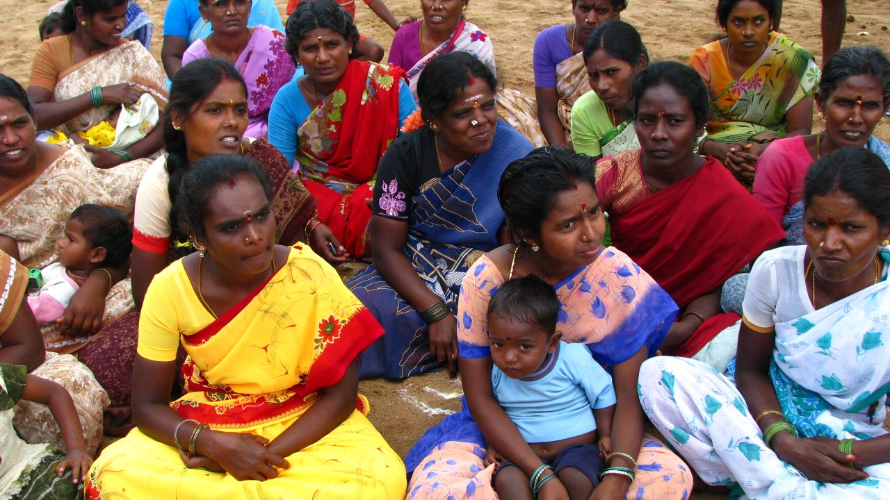 Community members gathered together in solidarity and grassroots empowerment in India